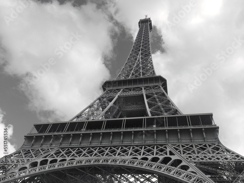 Eiffel Tower with white clouds in black and white