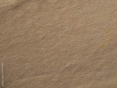 Background texture of coarse fibrous old brown paper. Grunge paper texture