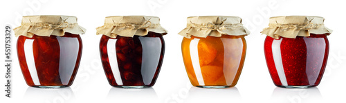 set of fruits jam in glass jars covered with wrapping paper isolated on white