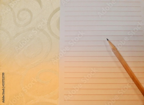 Pencil and paper of writing book for template background , banner , web , phamplet and brochure