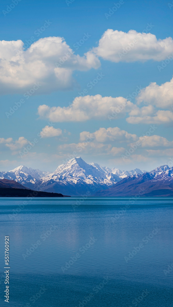 Vertical view with  landscape view of blue sky background over Mount Cook as lake pukaki, New Zealand