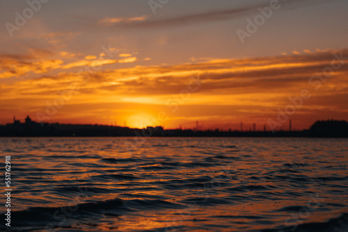 Beautiful sunset or dawn sky over the city. Dnipro.Ukraine. Background picture. Dramatic evening cloudy landscape in the city.Ukrainian city. View of the left bank. River Dnepr