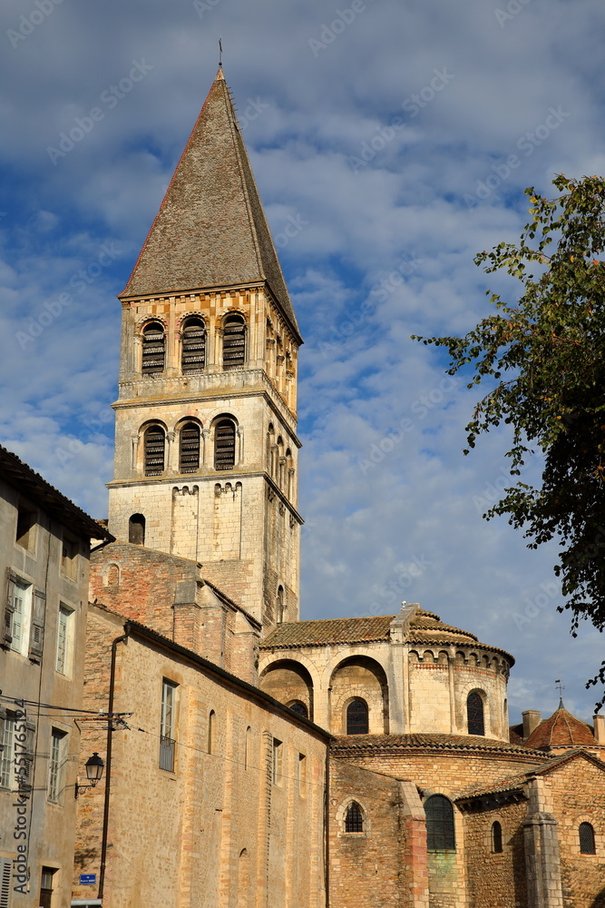 Close-up on the East side of Saint Philibert Abbey Church in Tournus, Burgundy, France, with its Roman external facade and tower