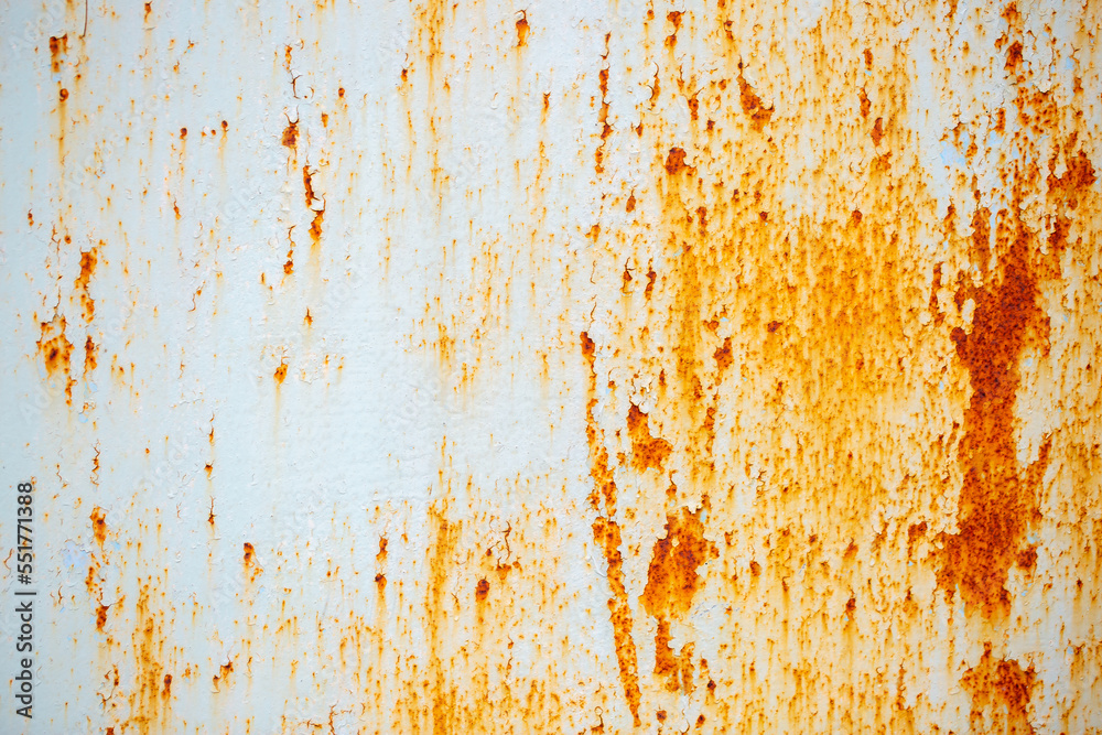 Texture of rusty iron, cracked paint on an old metal surface. Sheet of rusty metal with cracked and peeling paint, background for design with copy space.