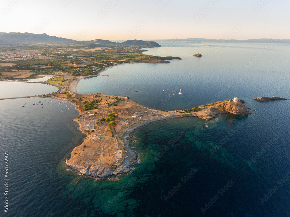 Top view with drone of Nora archaeological site at sunset Sardinia, Italy.
Ancient Roman ruins in Nora, near Pula in Sardinia, Italy