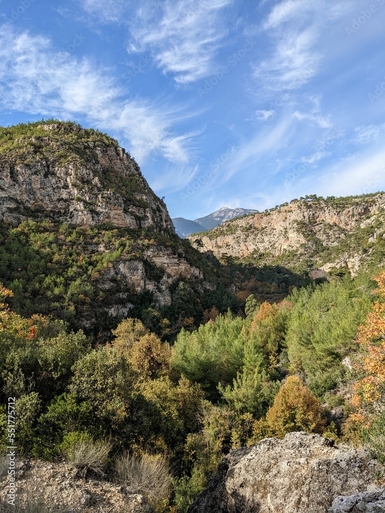 Autumn landscape of forests in the mountains. Mountains under a clear sky