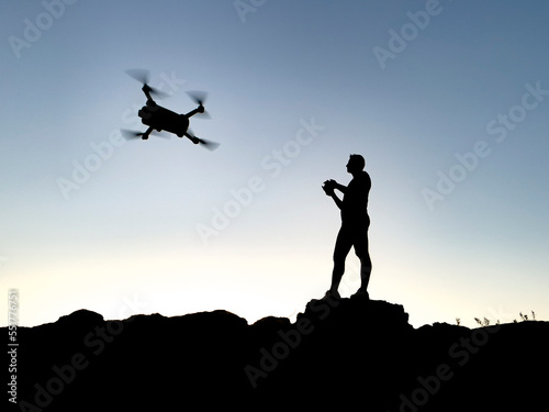 pilot using professional drone for media work