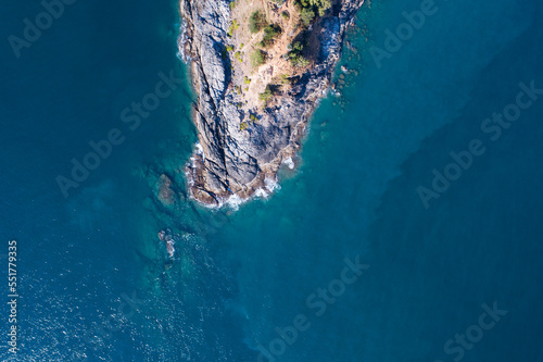 Aerial view of Amazing seashore at Phuket Thailand beautiful wave crashing on seacoast, Top view sea in summer season,Beautiful sea surface background