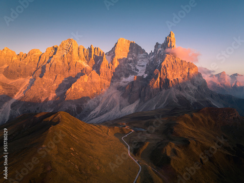 Pale di San Martino mountains during sunset. Aerial view. Rolle Pass, Trento Province, South Tyrol, Italy. © stefanotermanini
