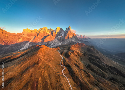 Pale di San Martino mountains during sunset. Aerial view. Rolle Pass, Trento Province, South Tyrol, Italy. © stefanotermanini