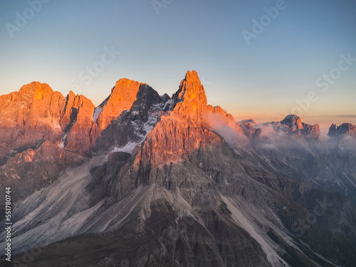 Pale di San Martino mountains during sunset. Aerial view. Rolle Pass, Trento Province, South Tyrol, Italy.