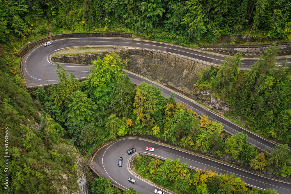 Fototapeta premium Bicaz pass mountain road high up in the Carpathian Mountains in Romania on a foggy autumn day