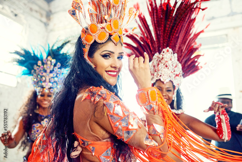 Party, brazil and carnival with woman dancers together in celebration of the new year in rio de janeiro. Portrait, dance and event with a female and friends dancing to music in festival tradition