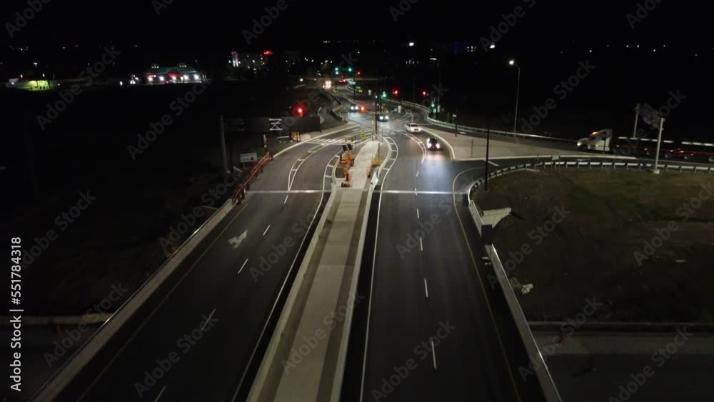 Aerial Flying Over Diamond Interchange At Night On The Queen Elizabeth Highway at Glendale Avenue in Niagara Falls. Dolly Forward Aerial Flying Over Diamond Interchange At Night On The Queen Elizabeth Highway at Glendale Avenue in Niagara Falls. Dolly Forward