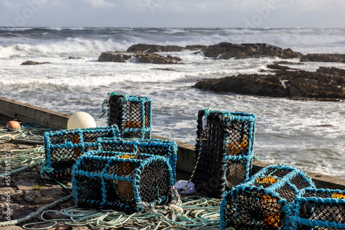 Obraz na płótnie Lobster pots in Rosehearty harbor on the north coast of Scotland w salonie