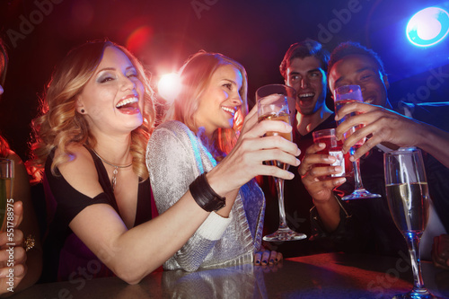 Canvas Print Party, wine and group of people in club for social, disco and night lifestyle at new year celebration together for happy hour drinks