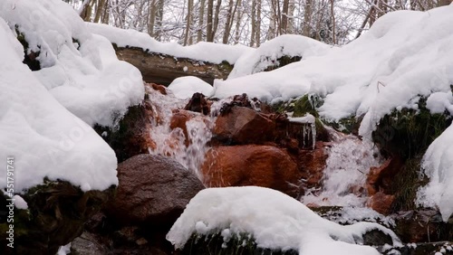 The Davida mill waterfall in winter near Cesis in Latvia. Gauja National Nature Park photo