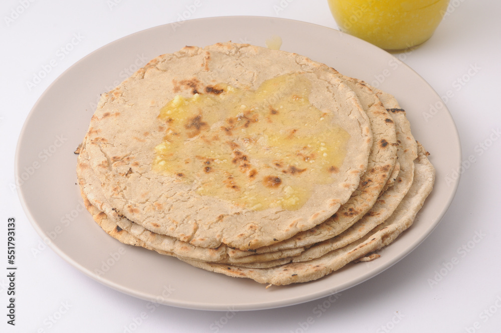 jowar bhakri with ghee butter, jowar is a grain popular in Maharashtra, Gujarat and Rajasthan