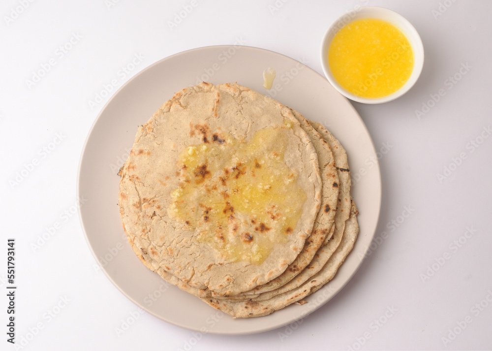 jowar bhakri with ghee butter, jowar is a grain popular in Maharashtra, Gujarat and Rajasthan jowar bhakri with ghee butter, jowar is a grain popular in Maharashtra, Gujarat and Rajasthan