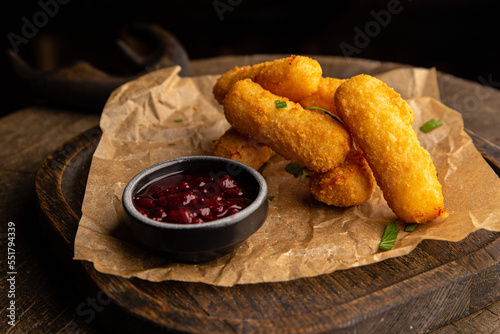 Bilde på lerret Cheese sticks with lingonberry sauce