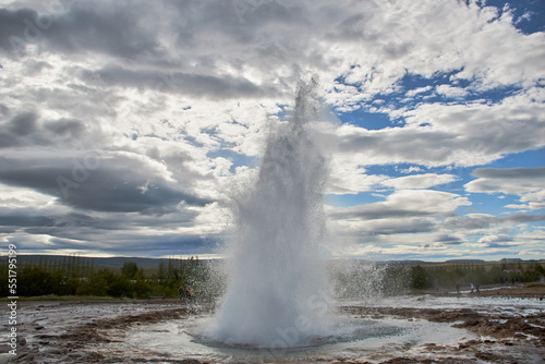Strokkur fountain-type geyser erupting in geothermal area, southwest Iceland, Europe.