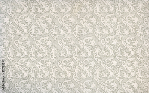 Used antique floral wallpaper with baroque shapes