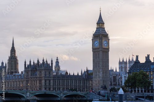 Palace of Westminster with its distinctive Tower of Big Ben at sunset and beautiful coloured sky, handheld shot.