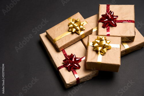 Christmas gift boxes with ribbons and paper decorations
