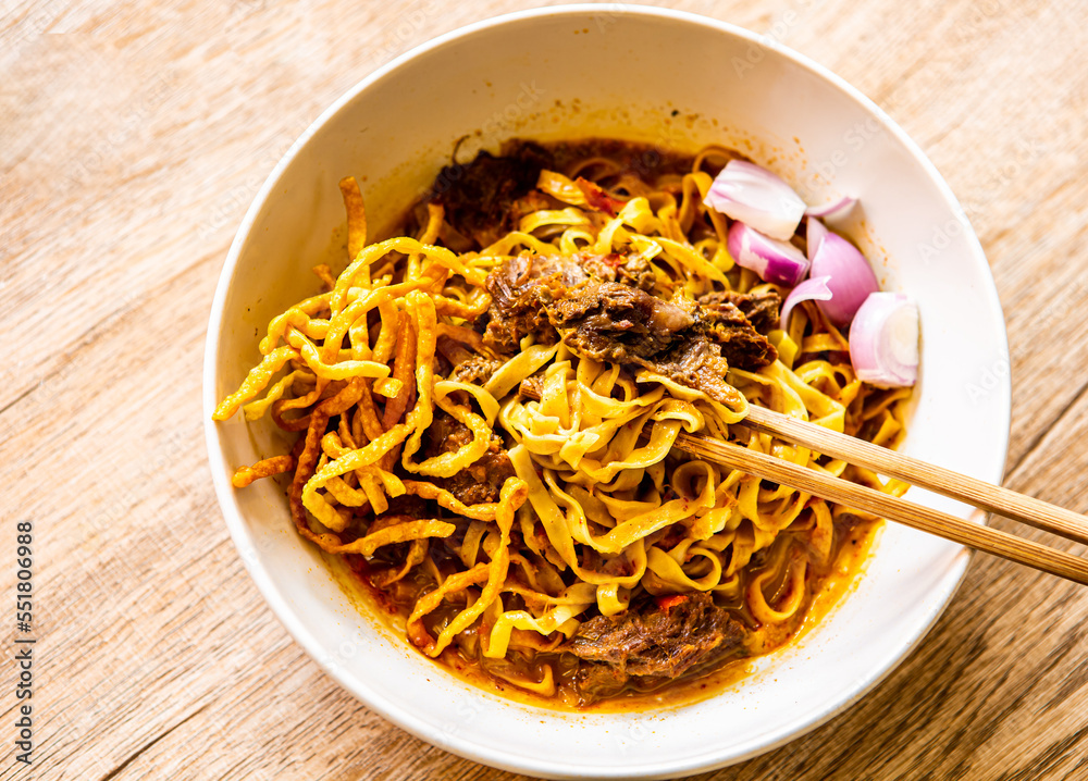 Northern Thai Curry Noodles with Beef or Khao Soi, Thai famous food. Northern Thai Curry Noodles with Beef or Khao Soi, Thai famous food.