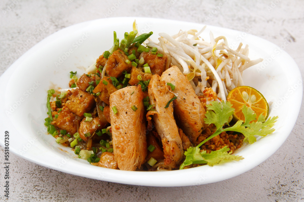 Freshly cooked Thai food called Chicken Pad Thai Freshly cooked Thai food called Chicken Pad Thai