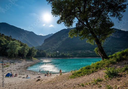 Fototapeta Naklejka Na Ścianę i Meble -  Lago di Tenno, turquoise lake in the mountains. Lake Tenno. Italy