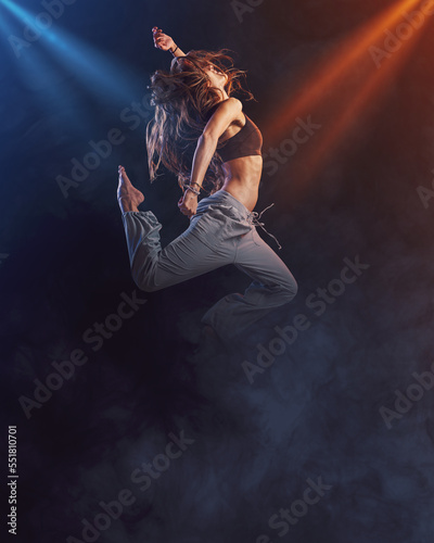 Professional dancer performing on stage © stokkete