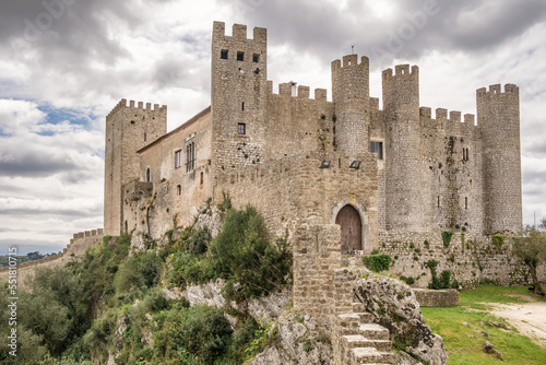 Castle of Obidos, a medieval fortified village at cloudy day in Portugal