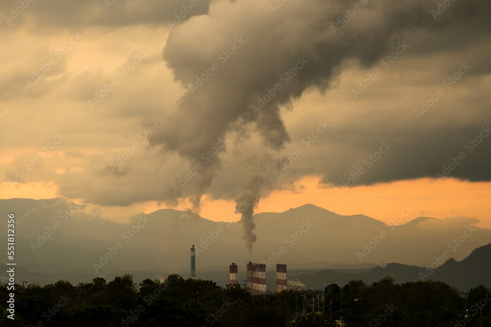 Time lapse of a coal power plant and steam pouring out of stacks at sunset. Aerial view of coal power plant at night. Industrial landscape Time lapse of a coal power plant and steam pouring out of stacks at sunset. Aerial view of coal power plant at night. Industrial landscape