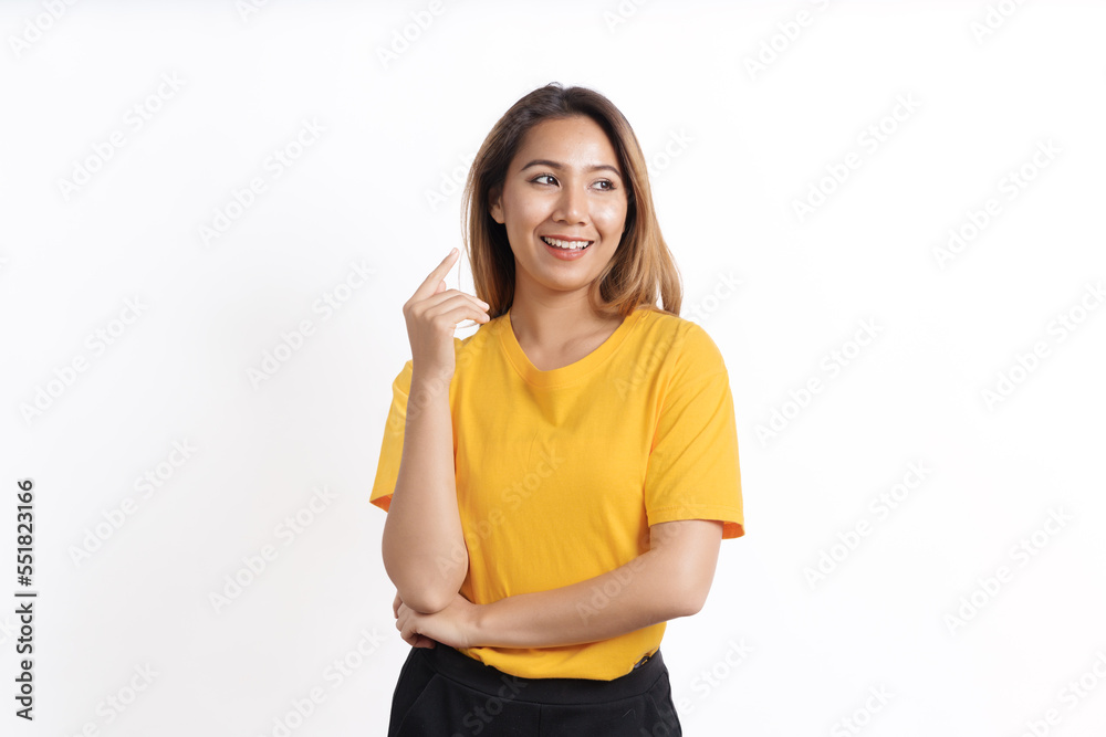 Hot asian pretty young woman smiling isolated on white, yellow t-shirt Hot asian pretty young woman smiling isolated on white, yellow t-shirt