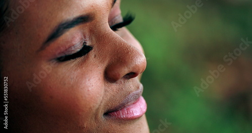 Slika na platnu Contemplative Black girl opening eyes and smiling