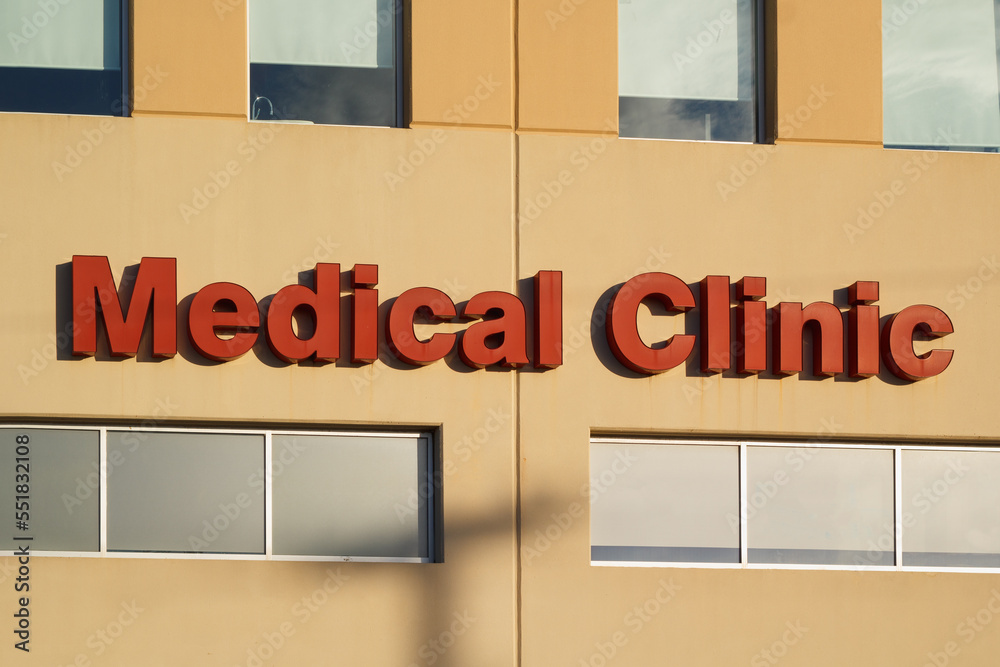 Medical clinic sign on office building exterior Medical clinic sign on office building exterior