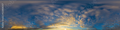 Panorama of a dark blue sunset sky with golden Cumulus clouds. Seamless hdr 360 panorama in spherical equiangular format. Full zenith for 3D visualization, sky replacement for aerial drone panoramas.