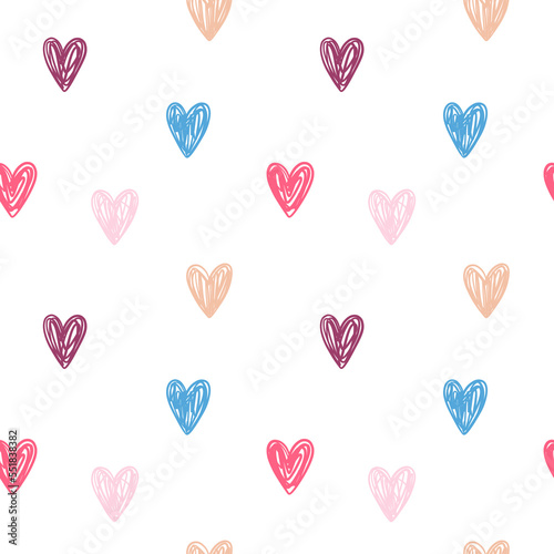 Vector seamless pattern with colored hearts on white background.  Hand drawn doodle style. Perfect for nursery fabrics, wrapping paper and wallpapers.