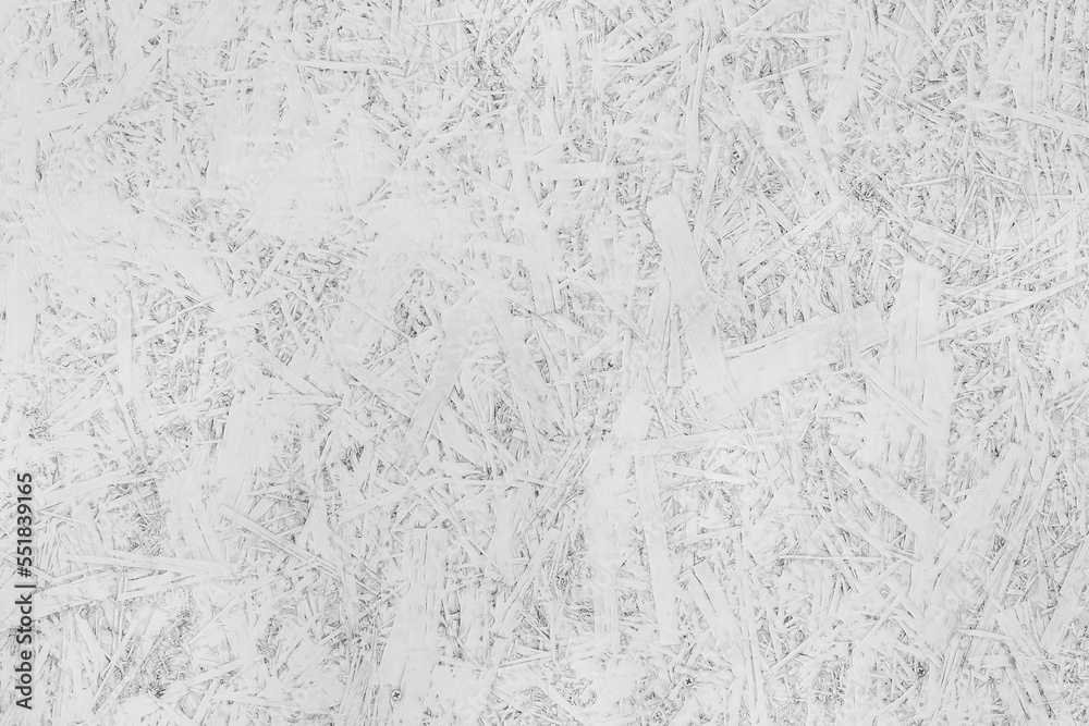 White paint on chipboard surface, pressed wood texture osb background White paint on chipboard surface, pressed wood texture osb background