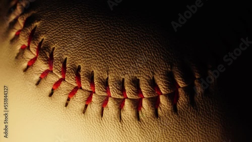 A baseball and equipment with a moving light follow