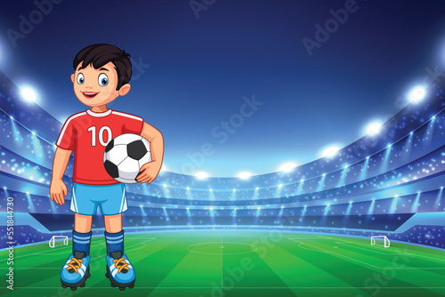 HAPPY BOY PLAYING SOCCER IN THE STADIUM