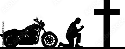 Motor cyclist Praying at Memorial Cross