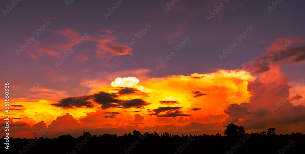 Amazing panoramic sunrise or sunset sky with gentle colorful clouds. Long panorama, crop it.