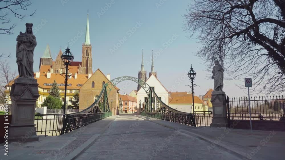 custom made wallpaper toronto digitalView of the Tumski Bridge and Ostrow Tumski in Wrocław. Old town, Poland, church, architecture, Roman Catholic, gothic, neo-gothic, gimbal. 4K Video Footage.