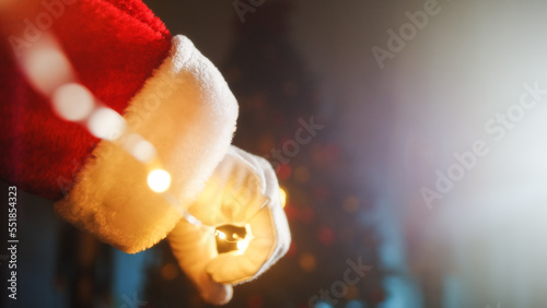 Santa Claus turn on Christmas Lights