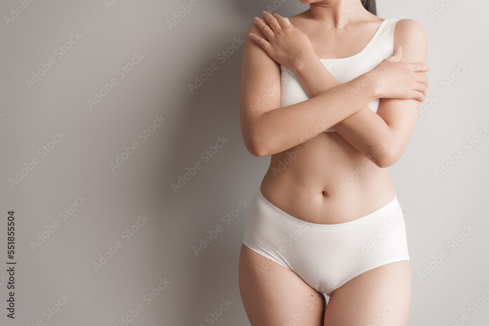 Close-up beauty asian woman in white bra and panties isolated over white background. - obrazy, fototapety, plakaty 