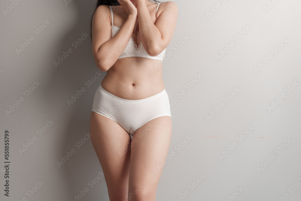 Close-up beauty asian woman in white bra and panties isolated over white  background. Stock Photo