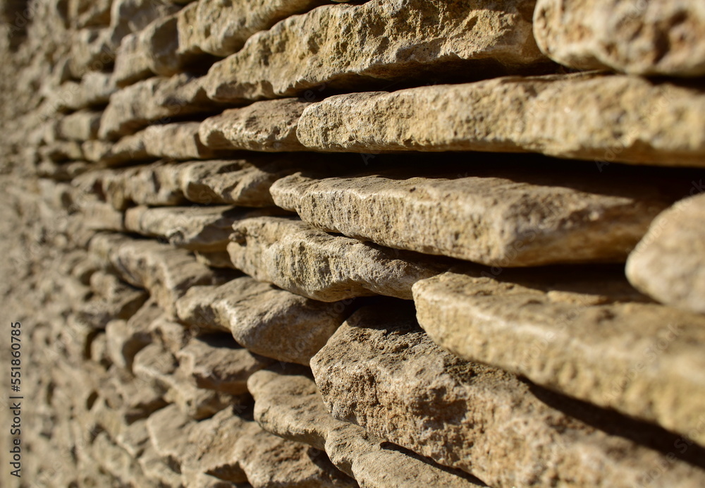 view of a the wall of a building made of natural stone view of a the wall of a building made of natural stone