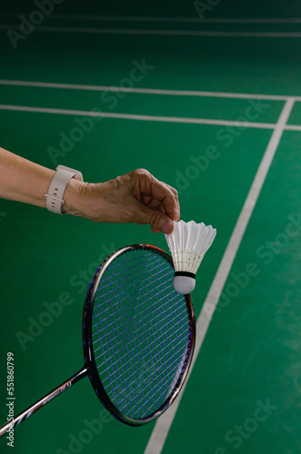 badminton courts with players competing © tewpai